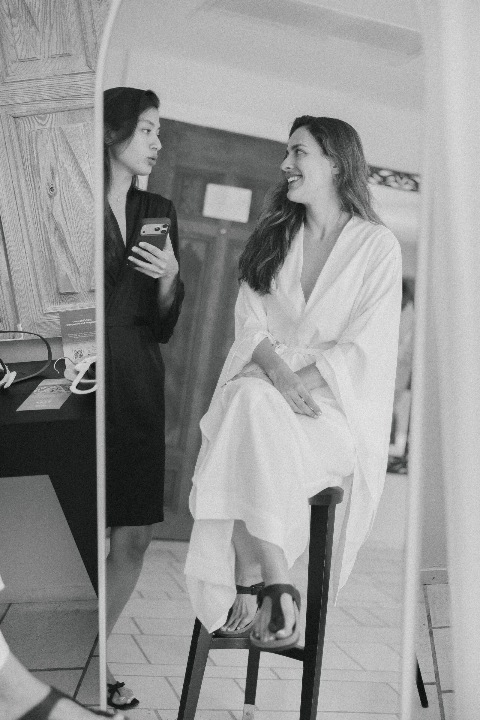 Bride getting ready in a white robe at The Marmara Bodrum