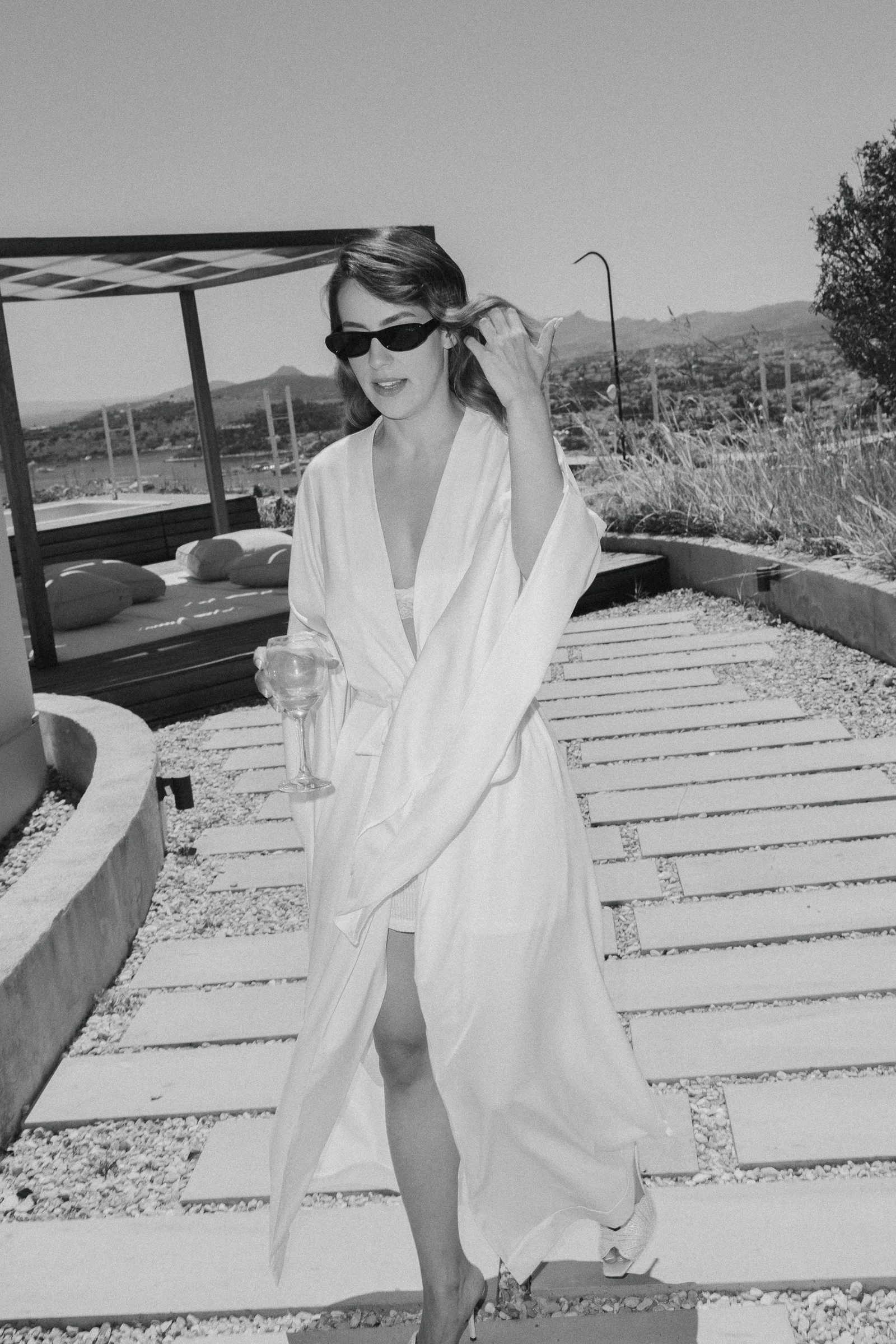 Bride in sunglasses on the steps, The Marmara Bodrum wedding